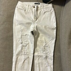 Fashion Nova white distressed jegging